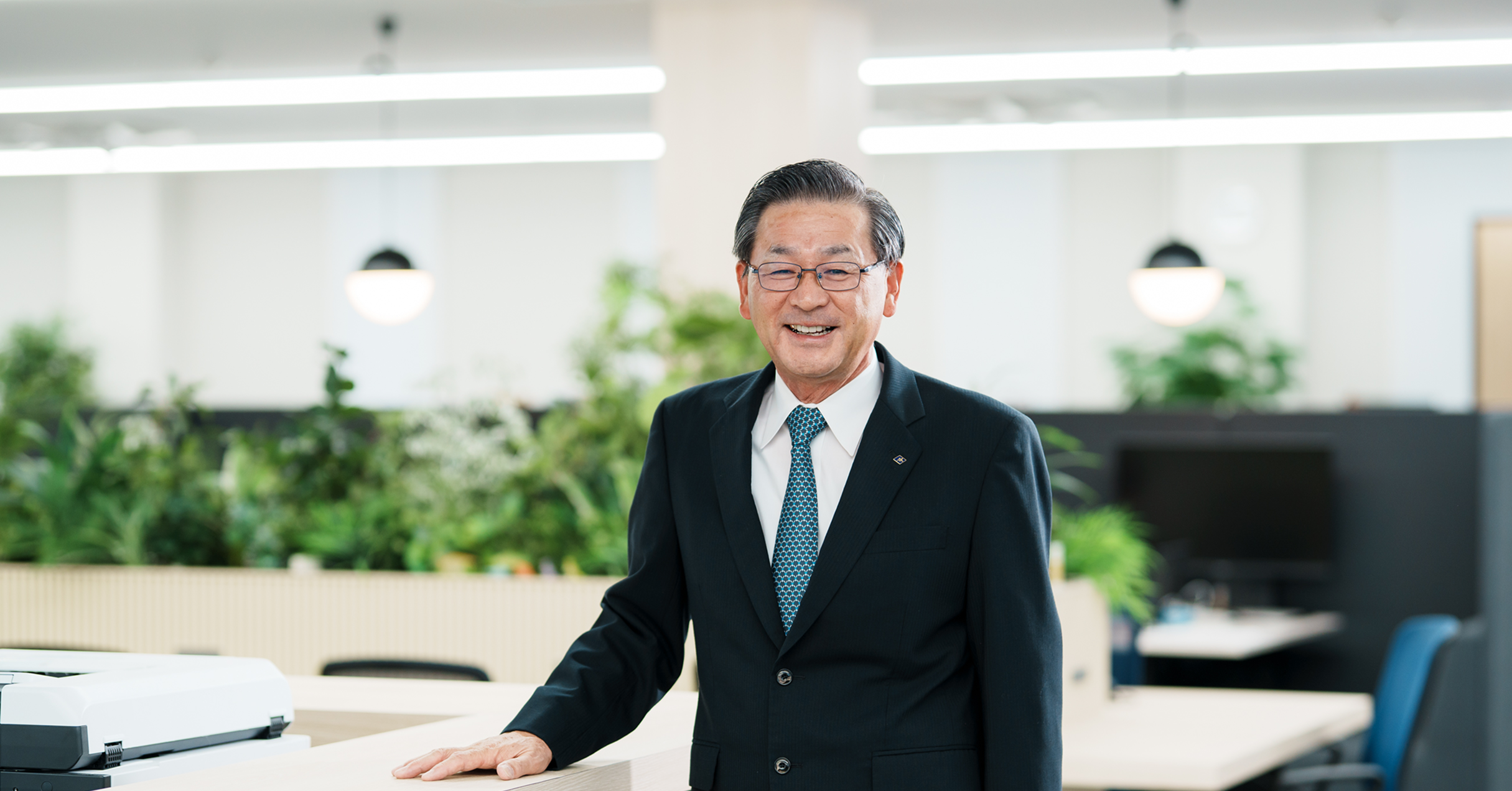 取締役社長　中根　徹